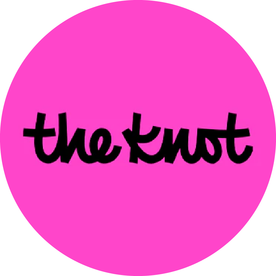 A bright magenta circular logo featuring "the knot" text in black handwritten-style font.