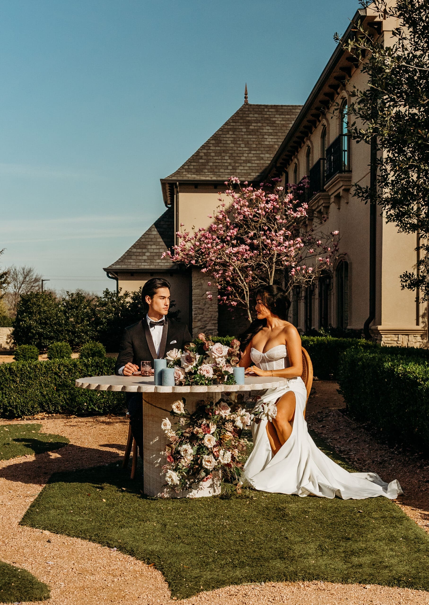 Bride and groom exchange vows at an elegant outdoor ceremony