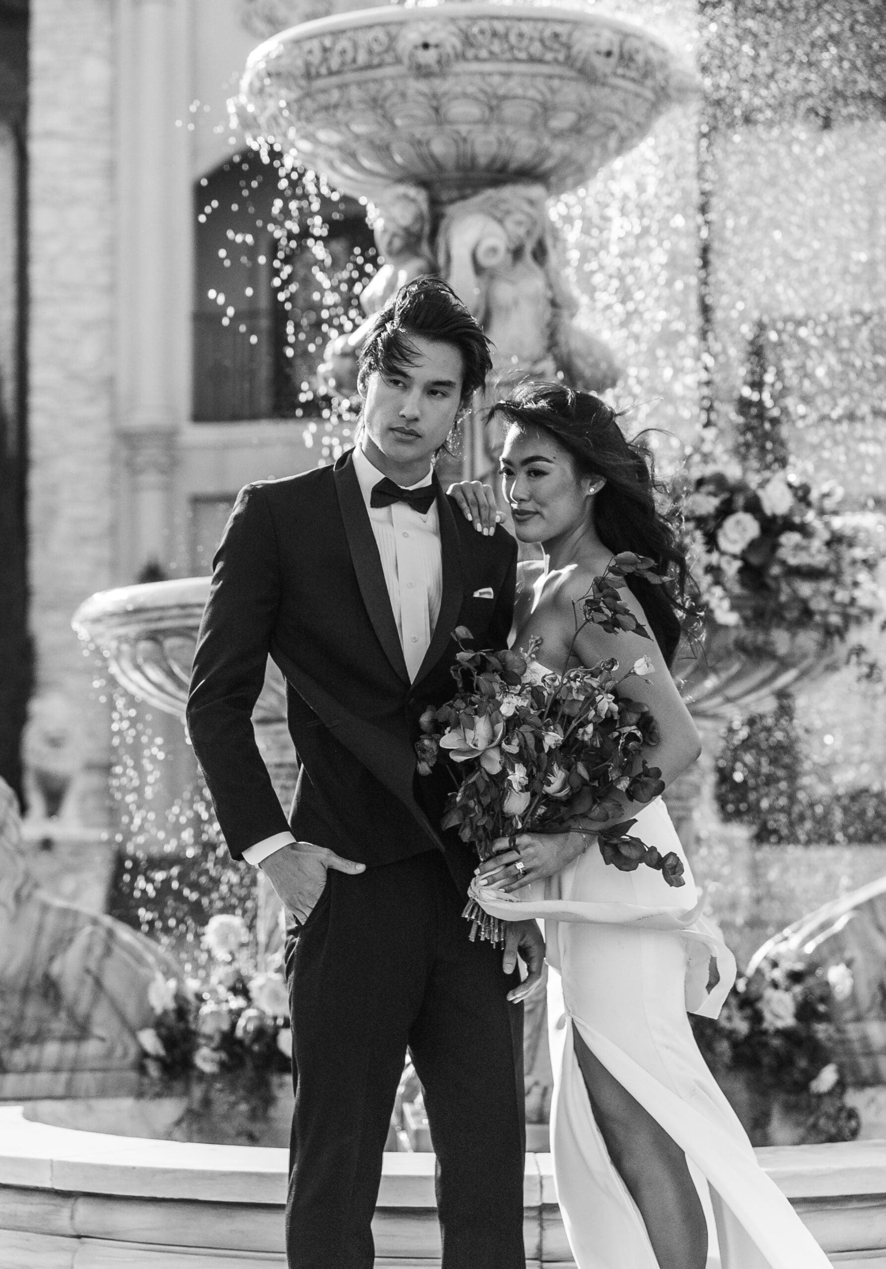 Formal couple dancing together at an indoor reception