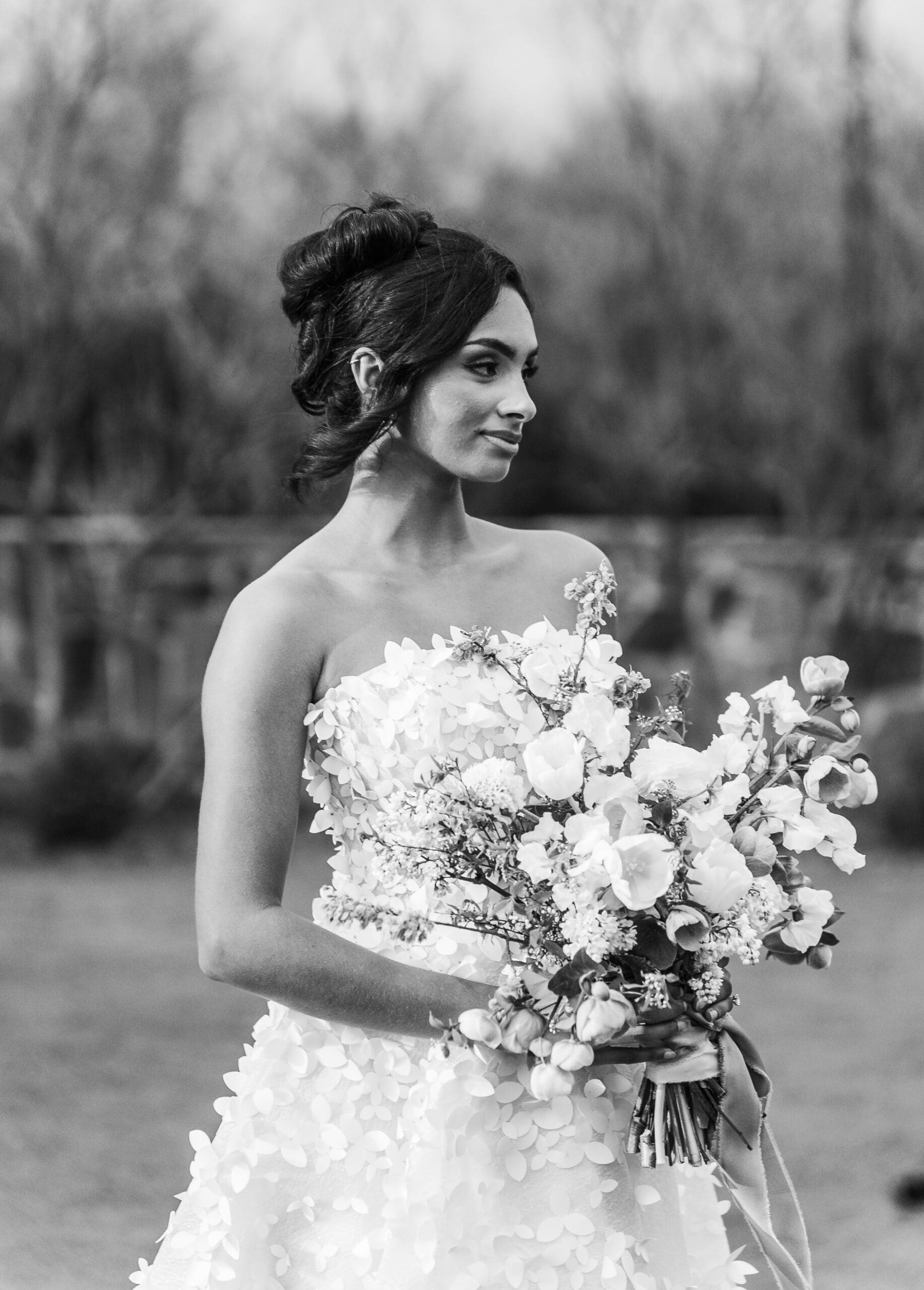 Black and white portrait of a bride in her wedding dress